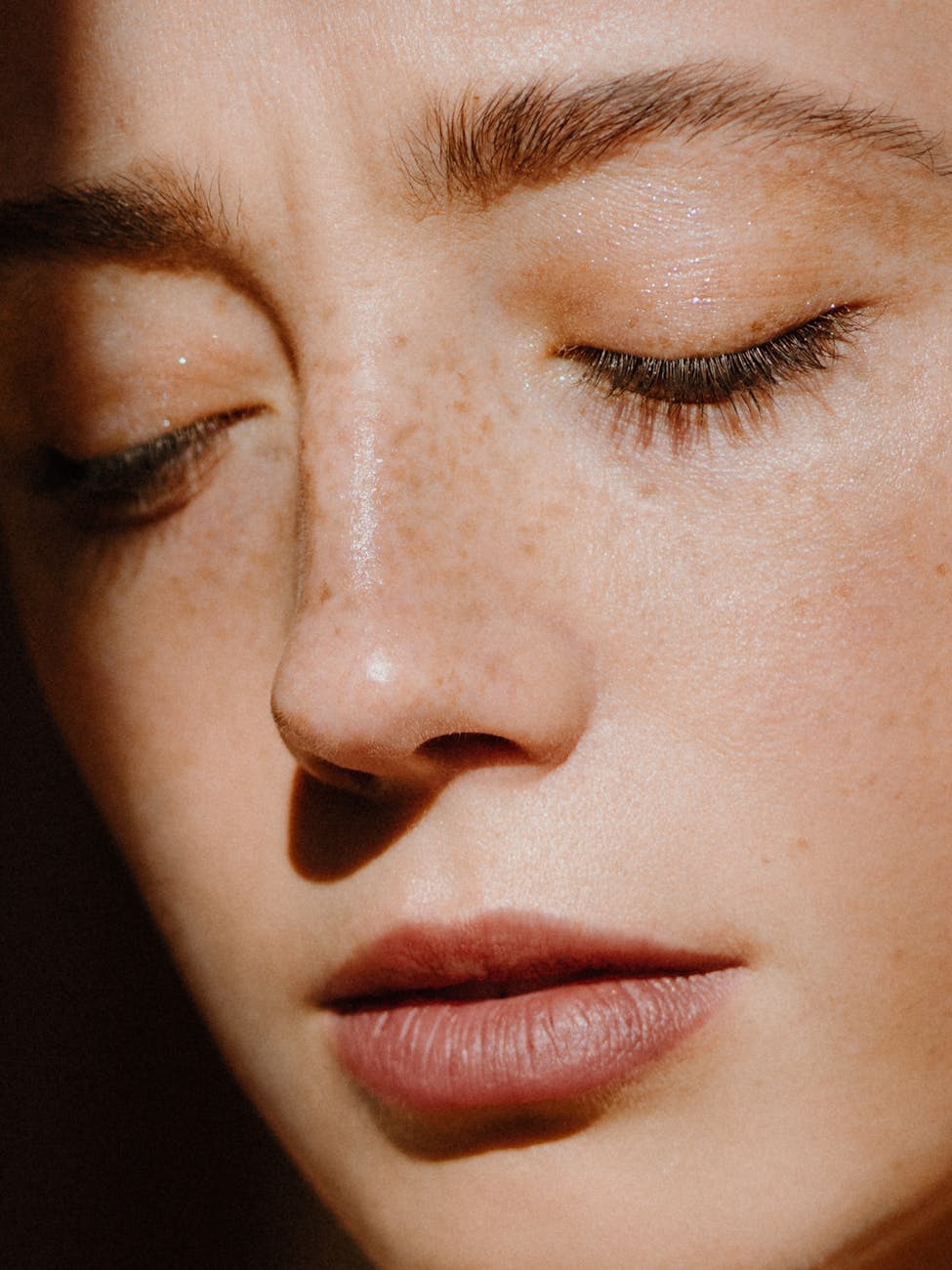 pexels-photo-4946400 crop face sensitive pretty woman in dark room