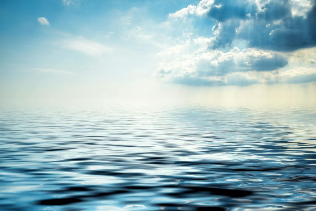clear sky over body of water