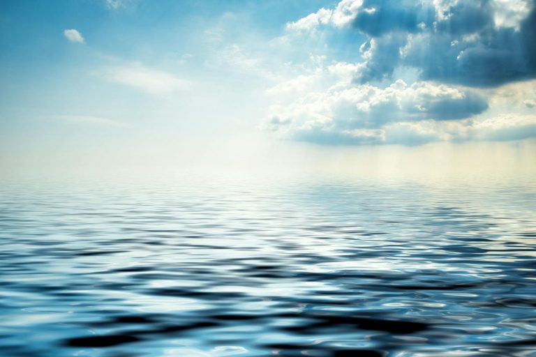 clear sky over body of water