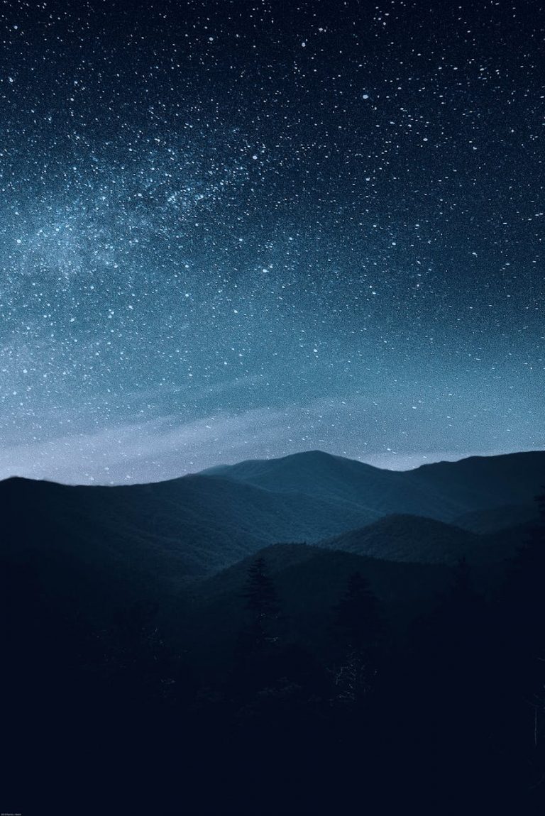 starry sky over mountains