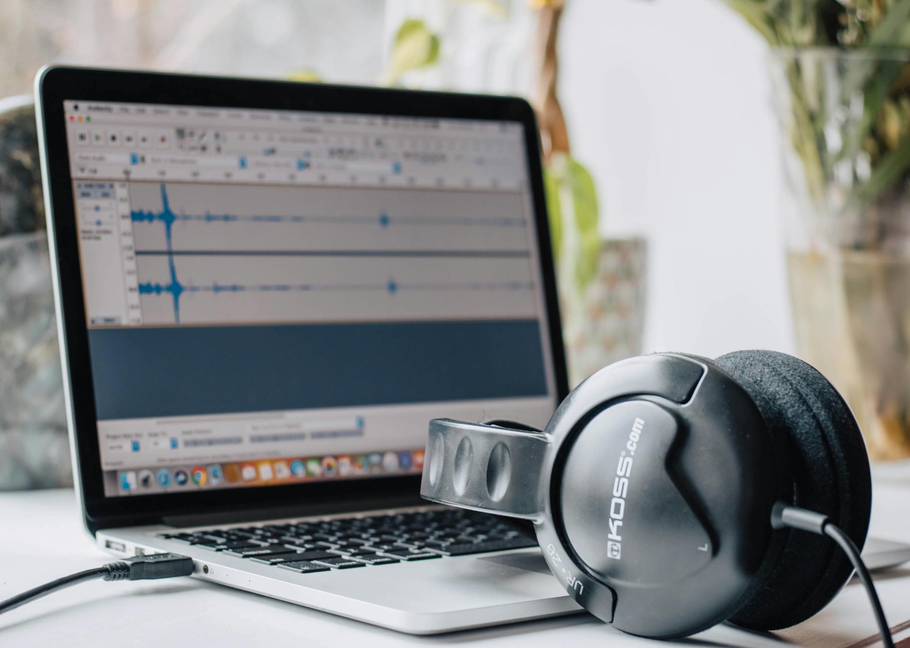 pexels-photo-3846434 black headphones on macbook pro