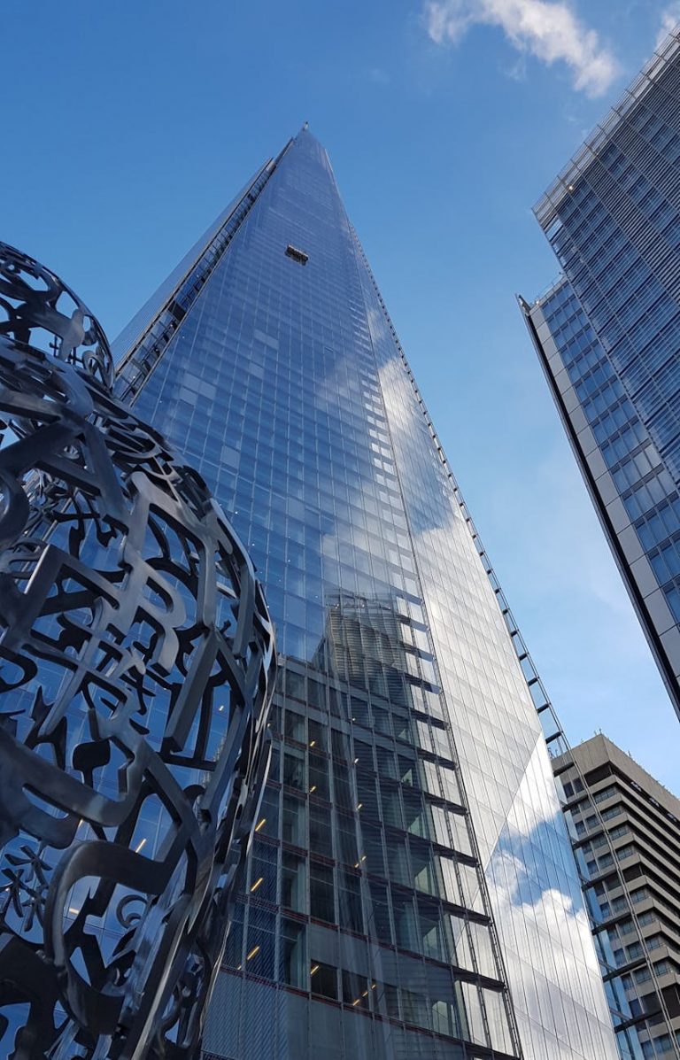 clear glass walled high rise building